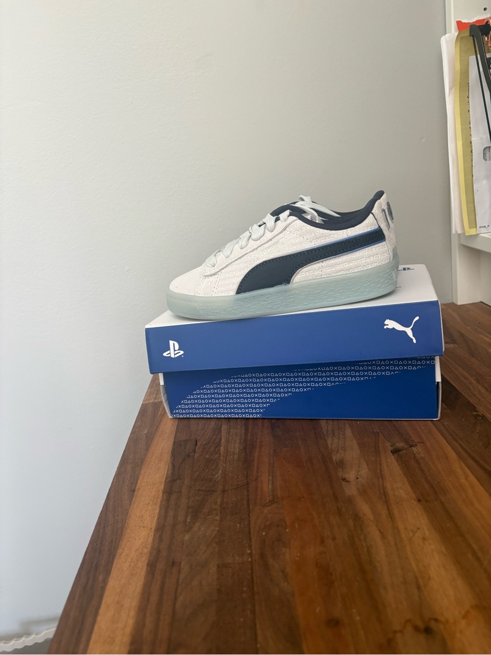 Puma Kids White Sneaker with Navy Formstrip